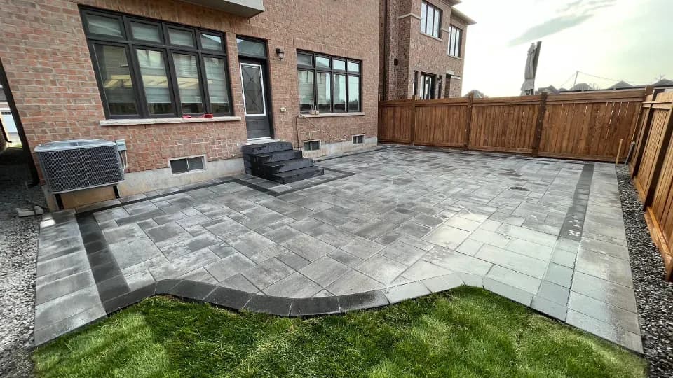 Close-up of interlocking paver pattern and border detail