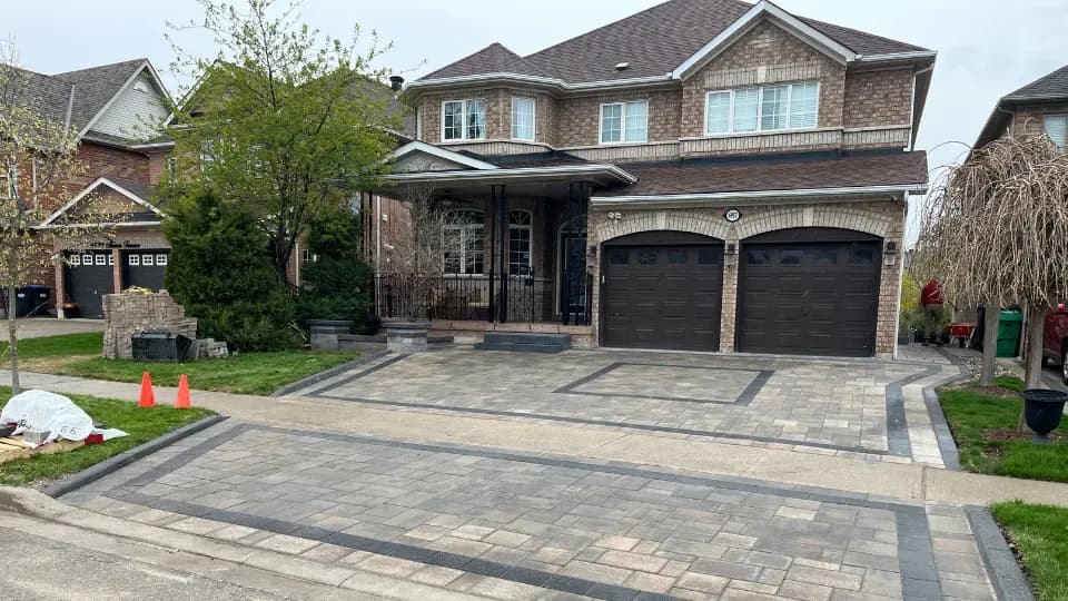 Driveway detail showing clean edge work and drainage