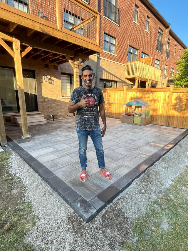 Client and contractor handshake at project completion in Missisauga