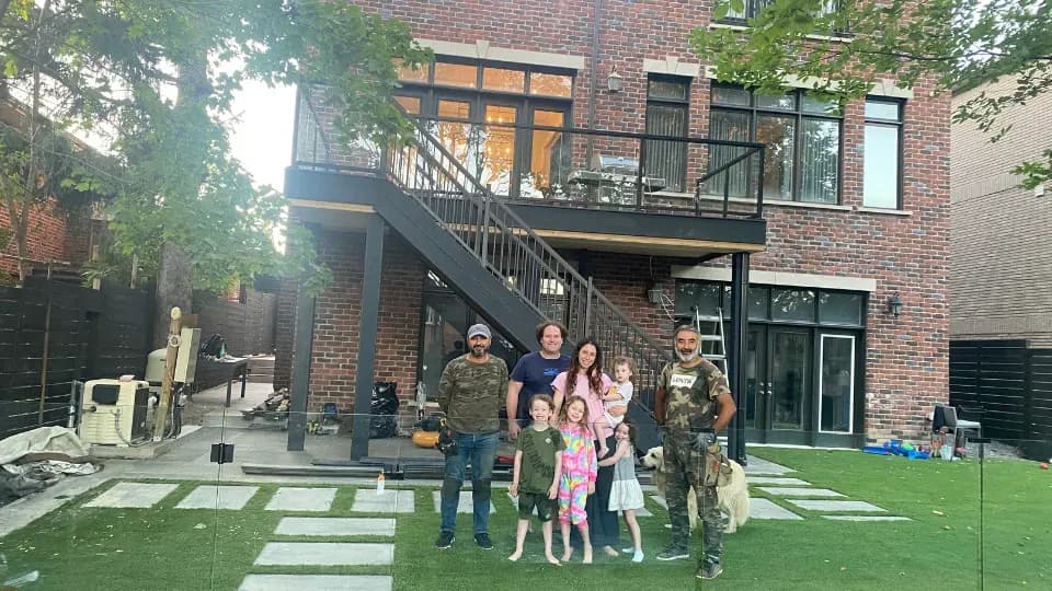 Complete backyard transformation with stone features