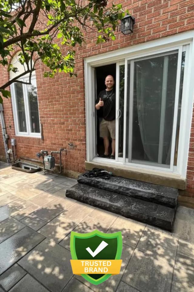 Another happy customer giving thumbs up at completed walkway project